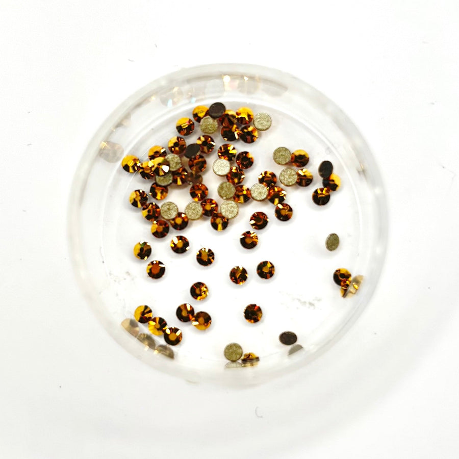 SWAROVSKI® - Guld