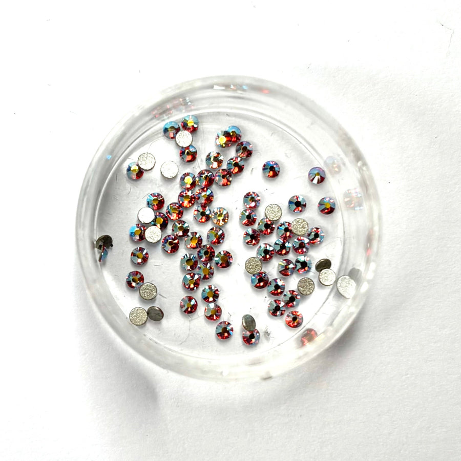 SWAROVSKI® - Orange-Skimrig